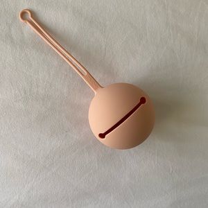 Mushie pacifier holder